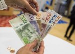Daha bir Avropa ölkəsi nağd qrivnanın yerli valyutaya dəyişdirilməsini dayandıracaq