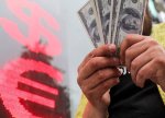 Dolların rubla məzənnəsi 103 rublu ötüb