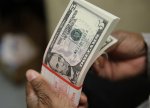 Dolar indeksi yüksəlir, neft qiymətləri düşür