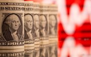 UBS: Dolların zəifləməsi bazarlara güclü təsir göstərmir