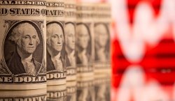 UBS: Dolların zəifləməsi bazarlara güclü təsir göstərmir