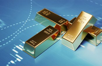 Qızılın spot qiyməti yeni tarixi rekord qırdı